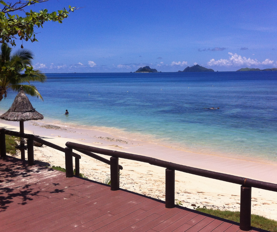 View of Mana beach across to the outer islands