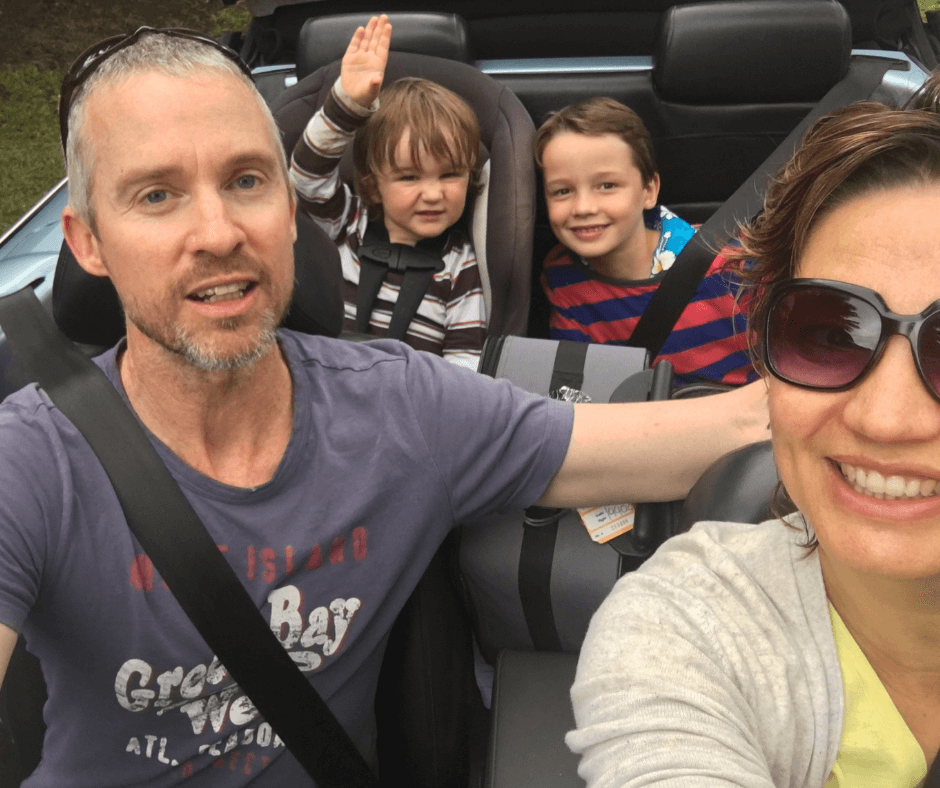 Quick family photo of the family in the car, best way to get around Rarotonga