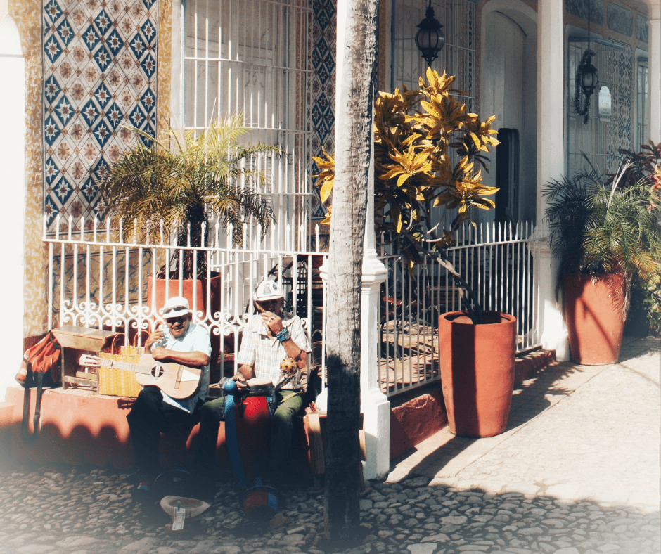 Two musicans sitting on the corner of Plaza Mayor