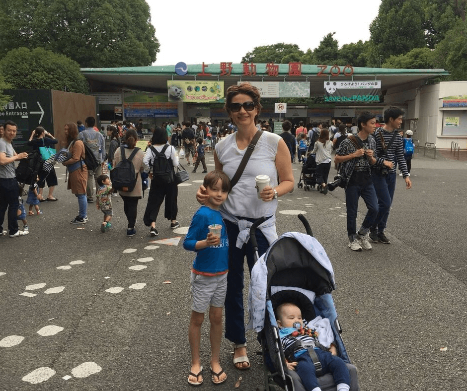 Quick family photo at the front entrance of the zoo