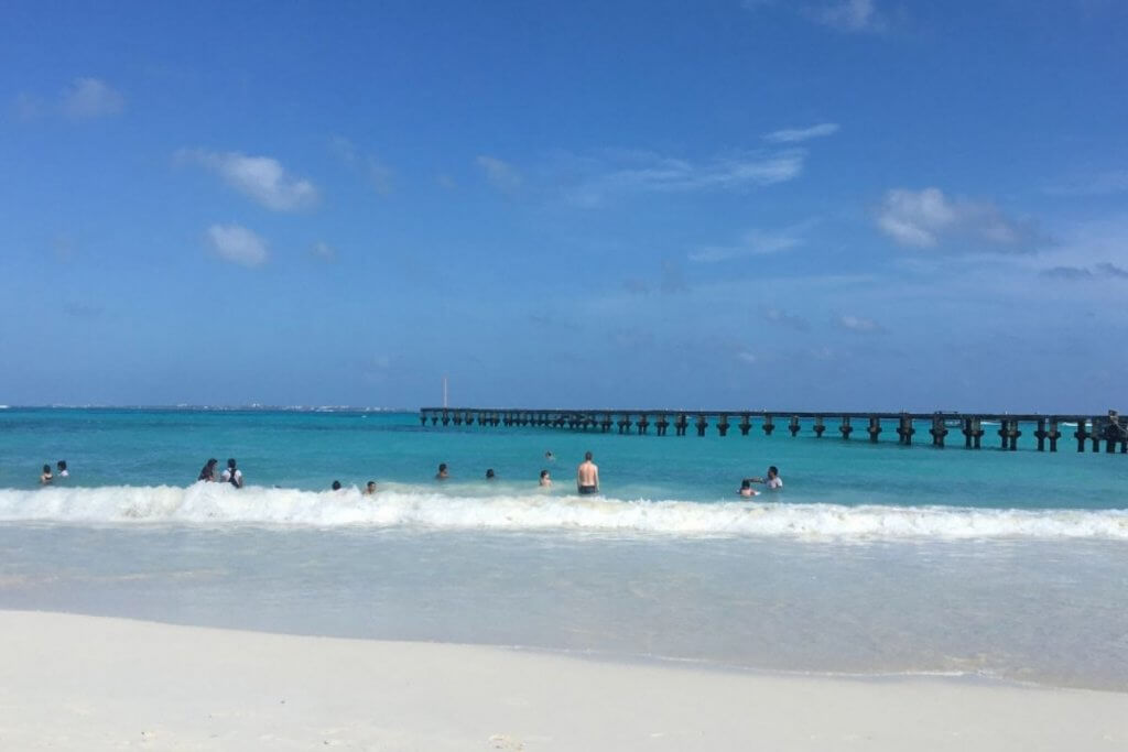 Playa Caracol, white sand beaches with rolling waves