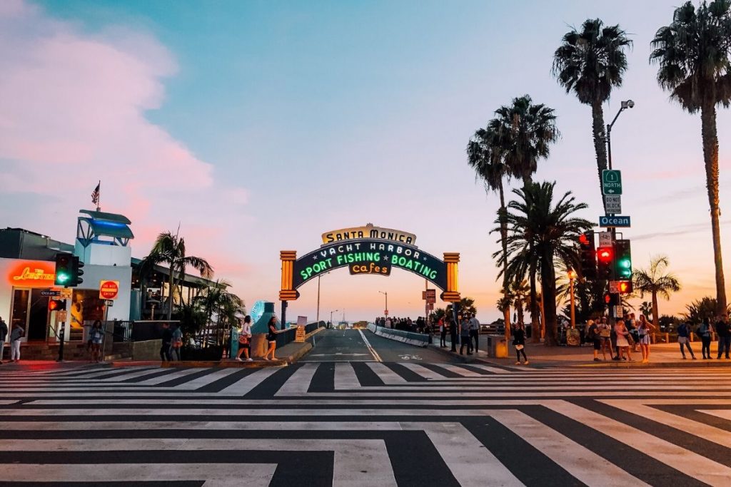 The famous Santa Monica sign as the sunsets and the lights turn on