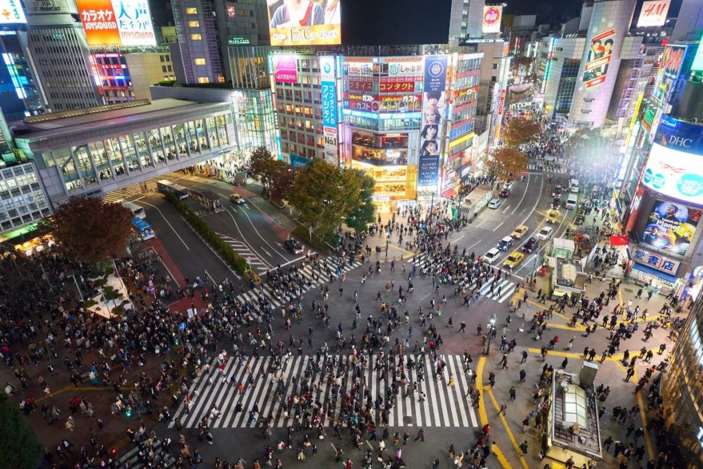 Shibuya Crossing at night a must do in Tokyo