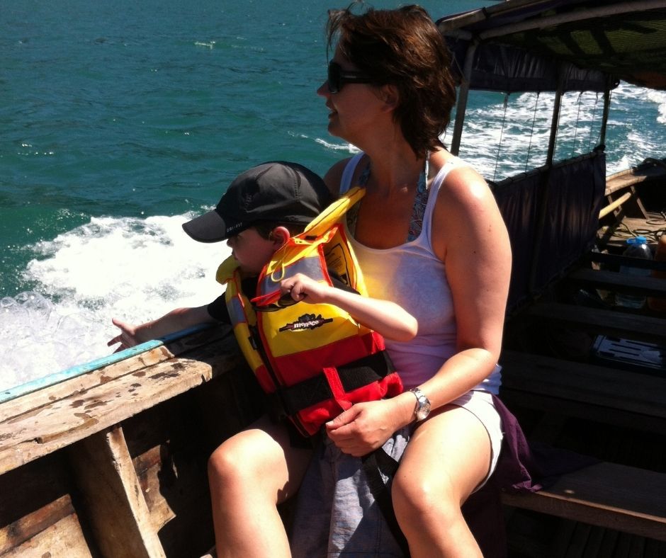 Connie and Lukas on a long boat