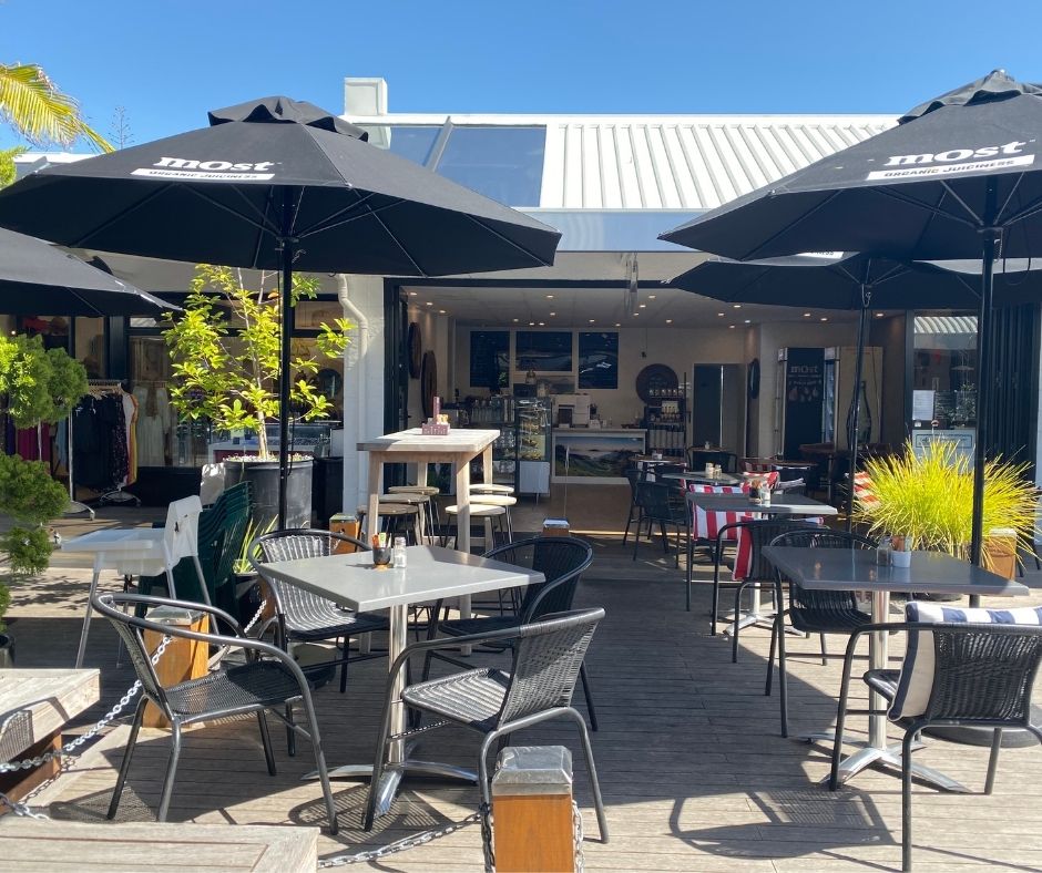 The outside sitting area at Catchy Cafe, shows why it's one of the best Mount Maunganui cafes to relax