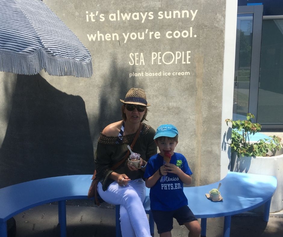 Connie and Sawyer sitting outside with their ice creams