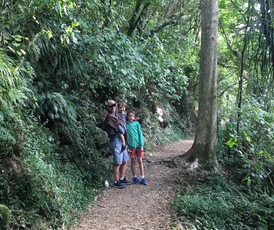 All the boys standing of the Rail Tunnel Loop trail smiling