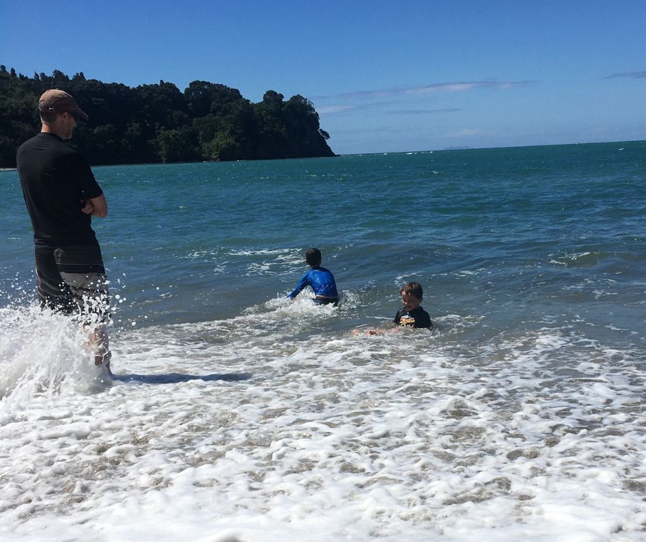 Boys enjoying themselves in the water