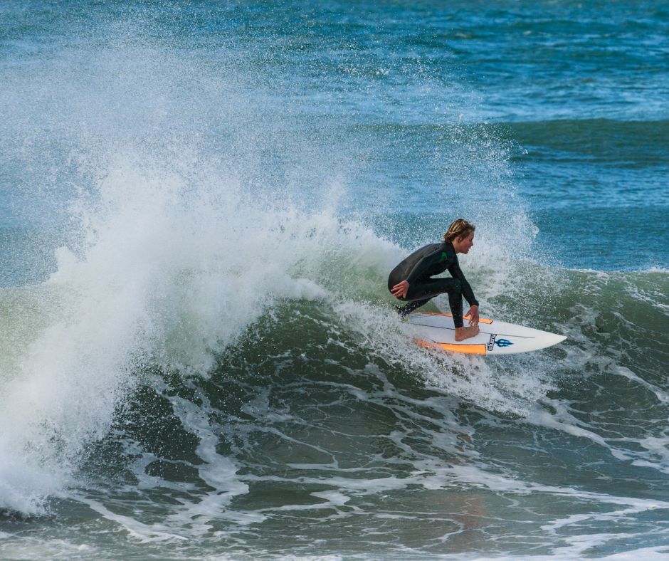 Surfer catching a wave