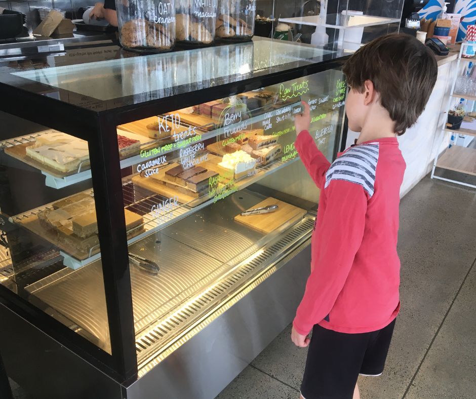 Sawyer picking a slice from the cabinet