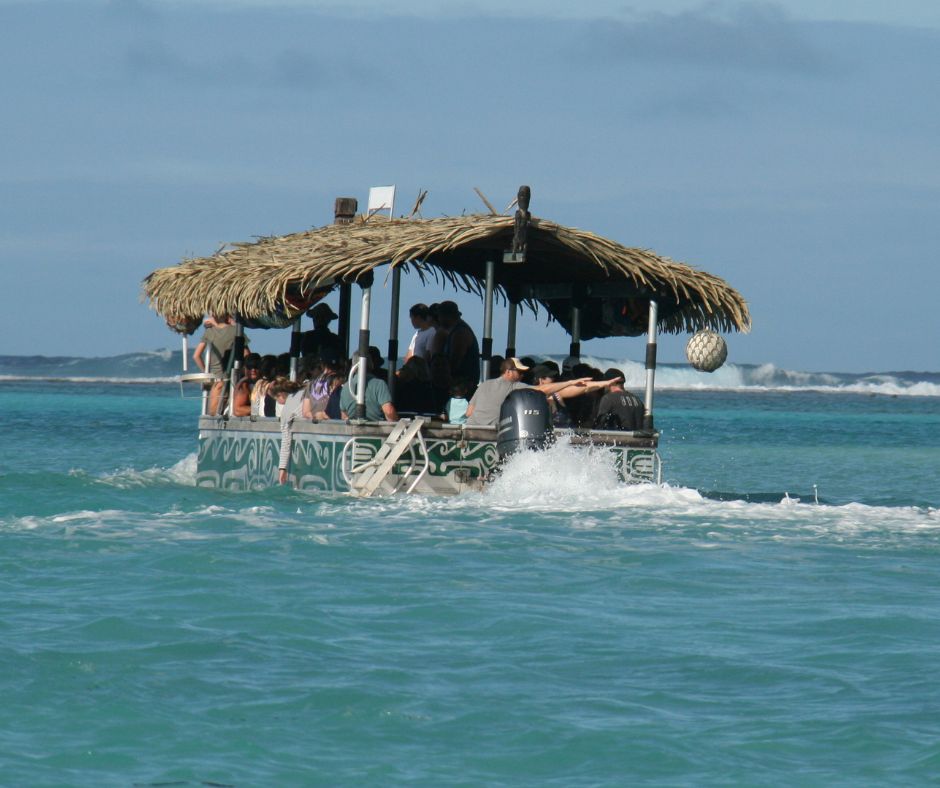 Cruising along lagoon towards the marine reserve. The 2nd Koka Lagoon Cruise boat just in front