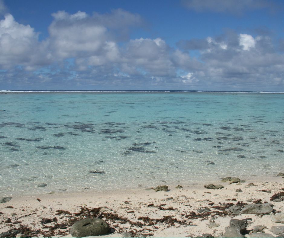 Around the back of Motu Koromiri. Looking out at the clear water towards to reef