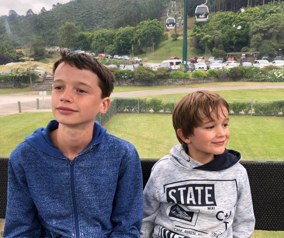 Lukas and Sawyer heading up to the rotorua luge on the Gondola