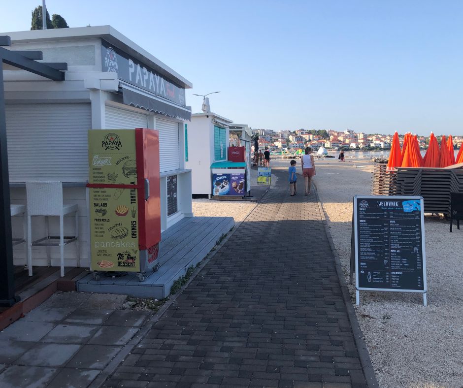 Morning walk along Copacabana Beach boardwalk before the crowds arrived 