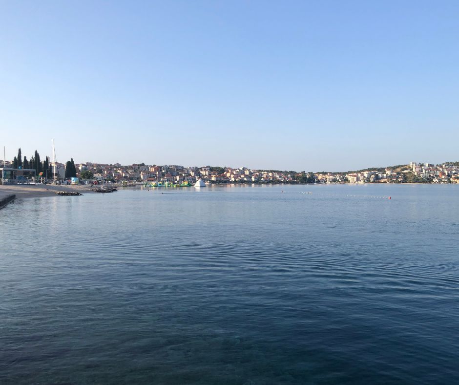 Looking across the sea at  Copacabana Beach and Okrug Gornji 