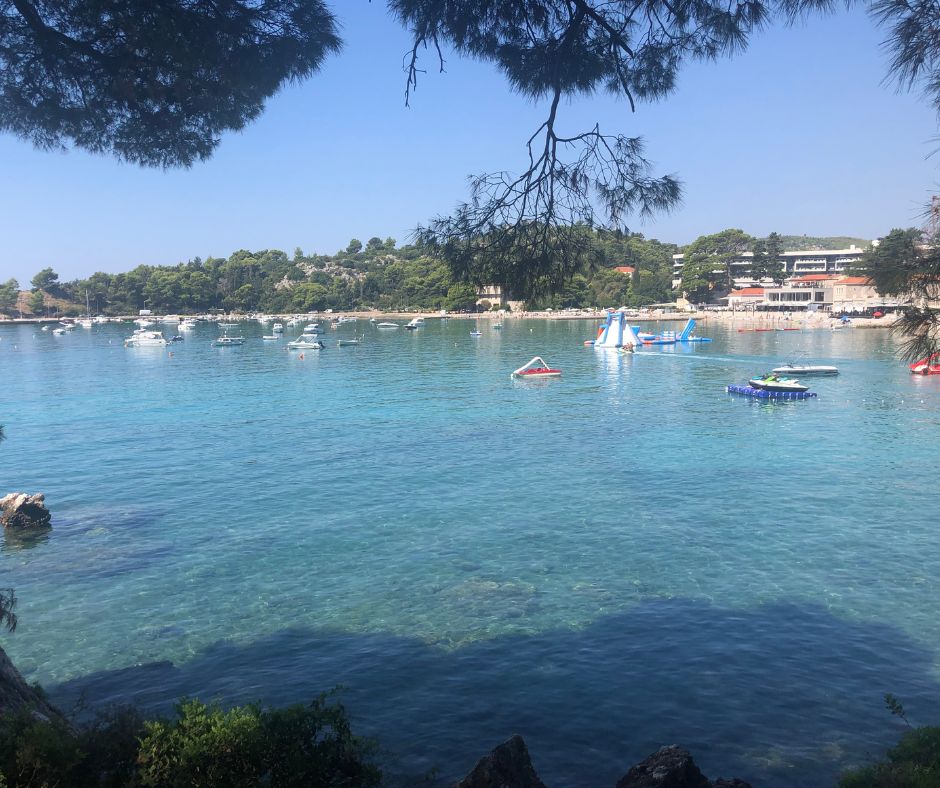 Looking across the calm waters of Srebreno Beach