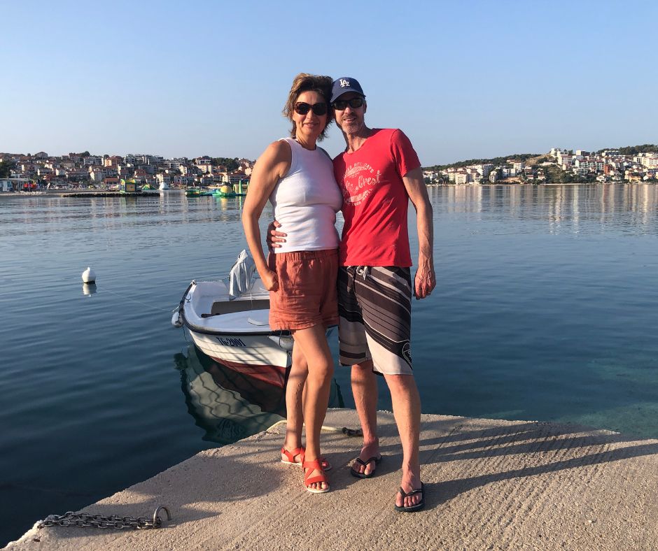 Mum and Dad posing for an early morning photo. Over looking the calm waters and Okrug Gronji