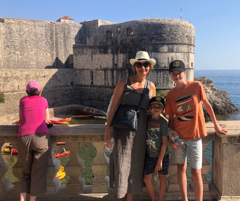 Family photo with Fort Bokar in the background