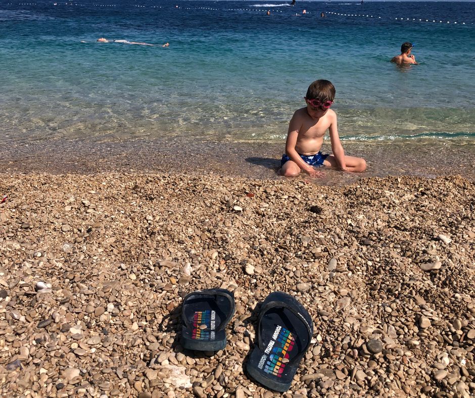 Sawyer chilling on the shores in Zlatni Rat beach