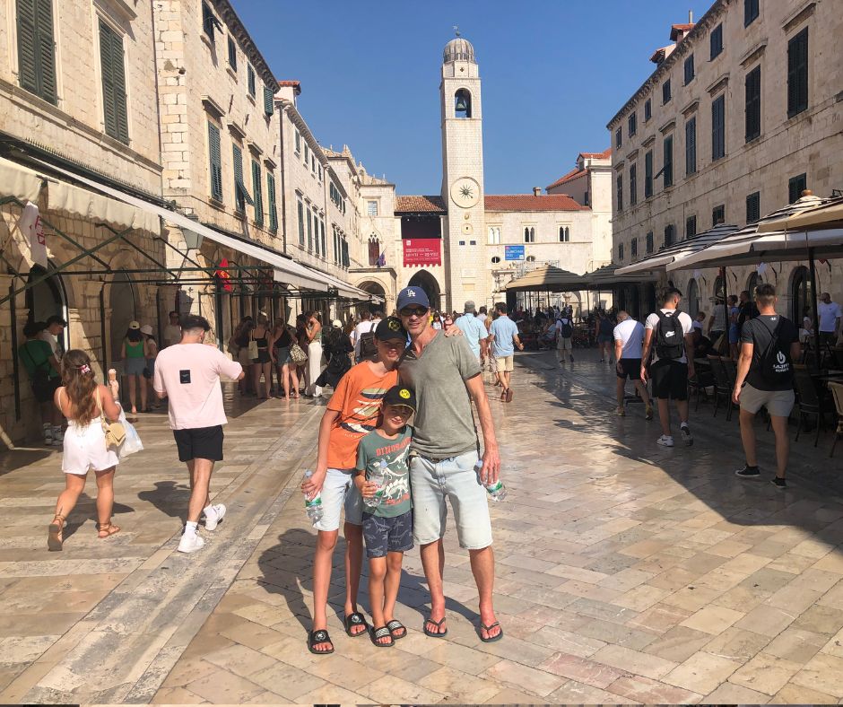 The boys in front of the Clock Tower of Dubrovnik