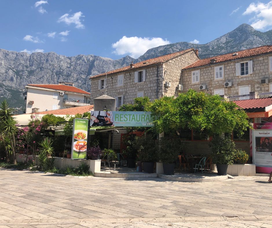 Beautiful old town of Makarska with the Biokovo Mountains behind