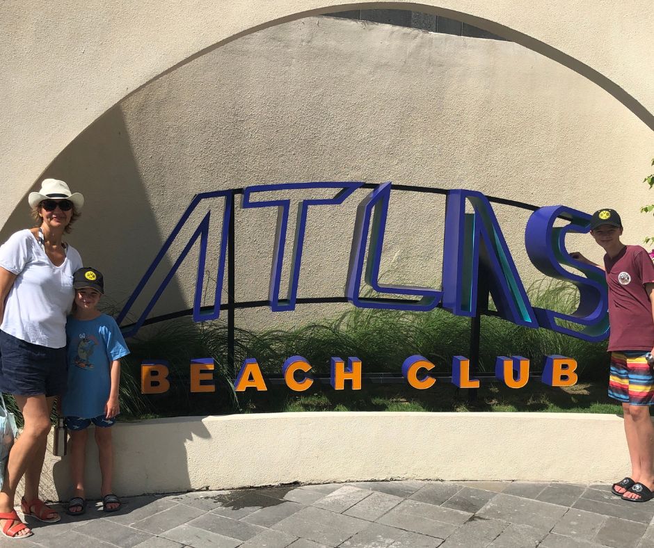 Connie and the boys at the entrance to Atlas Beach Club