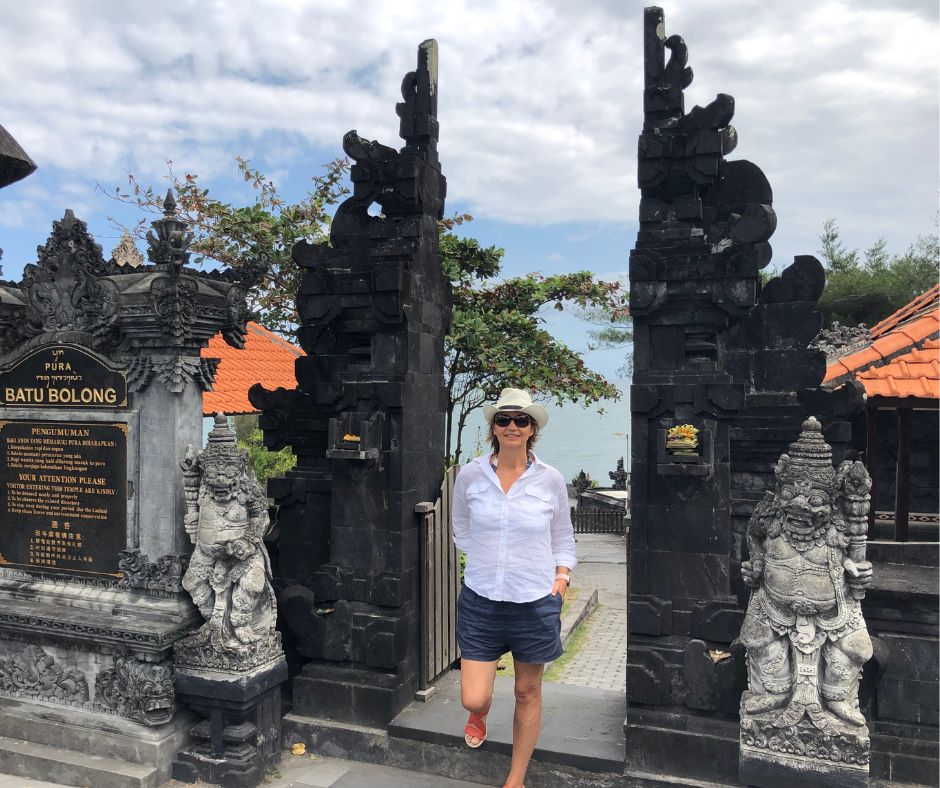 Connie standing at the gates into Batu Bolong