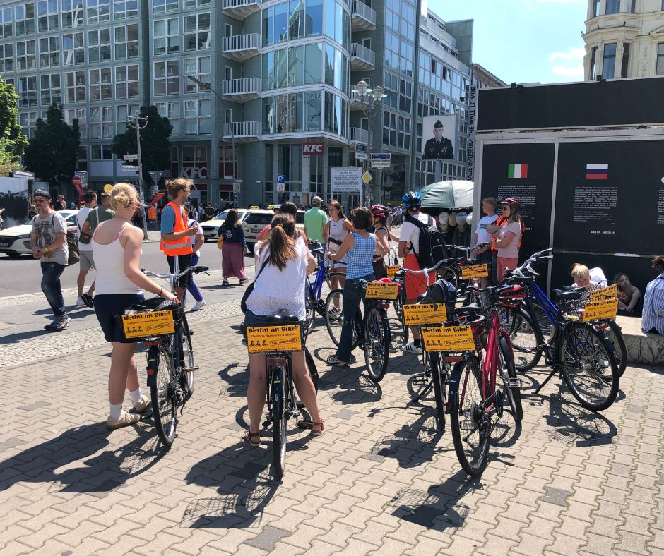 A biking tour rode past us at Check Point Charlie.