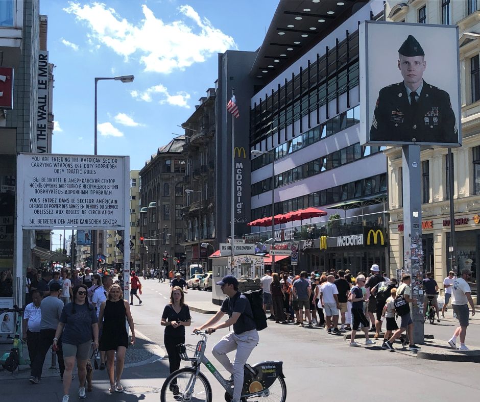 The entrance to Checkpoint Charlie, very busy with lots of people