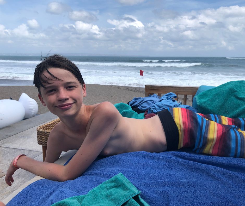 Jazzy relaxing on the sun bed that over looks the beach. Atlas Beach Club with kids is a great way to spend the day