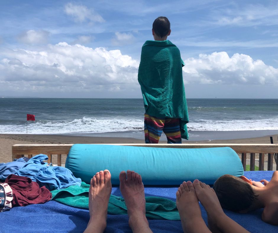 Admiring the view of the beach from our day bed. Atlas Beach Club with kids is perfect