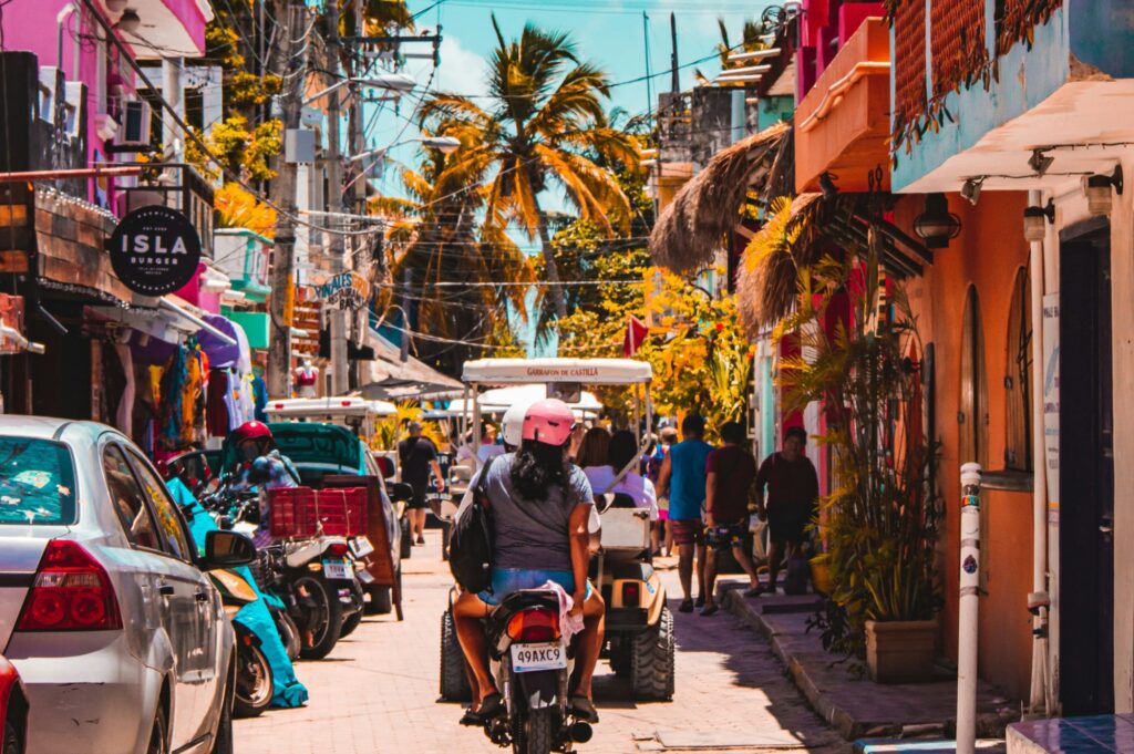looking down the colourful buildings into Downtown Isla Mujeres